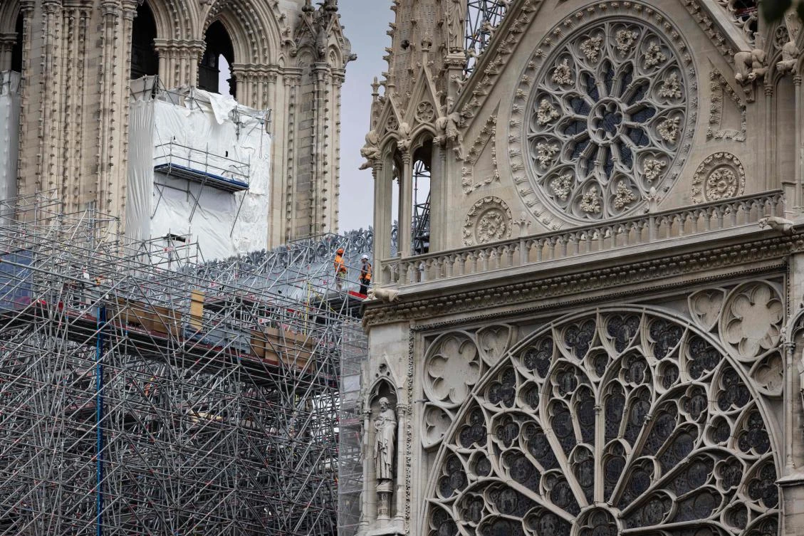 Macron to honor craftspeople who rebuilt Notre Dame