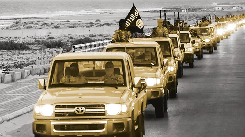 Members of Daesh group parading in a street in Libya's coastal city of Sirte, which lies 500 kilometres (310 miles) east of the capital, Tripoli. AFP