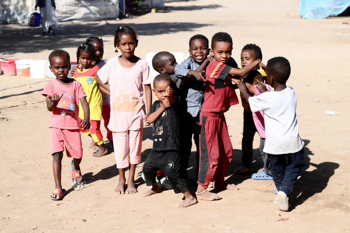 Displaced Sudanese children, who are mostly from the capital Khartoum, play at "Abdallah Nagi" shelter camp, in Port Sudan on Tuesday. (Reuters)