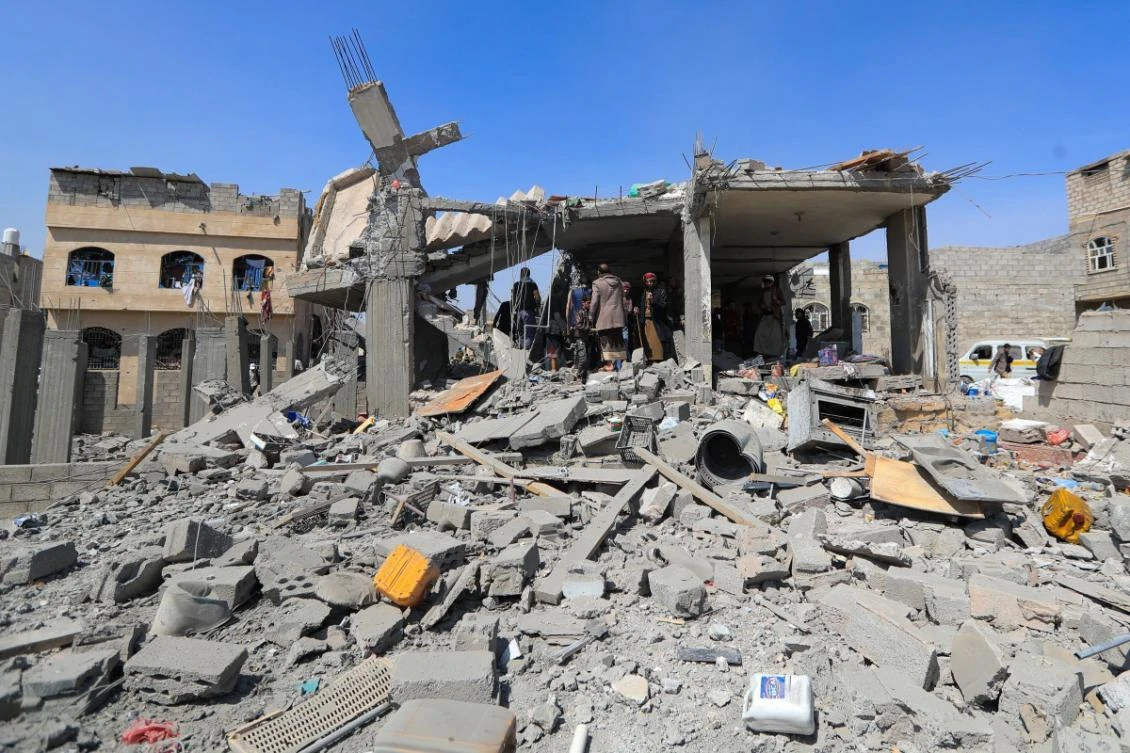 People inspect the site of a reported US airstrike in Sanaa, a day after the attack. (File/AFP)