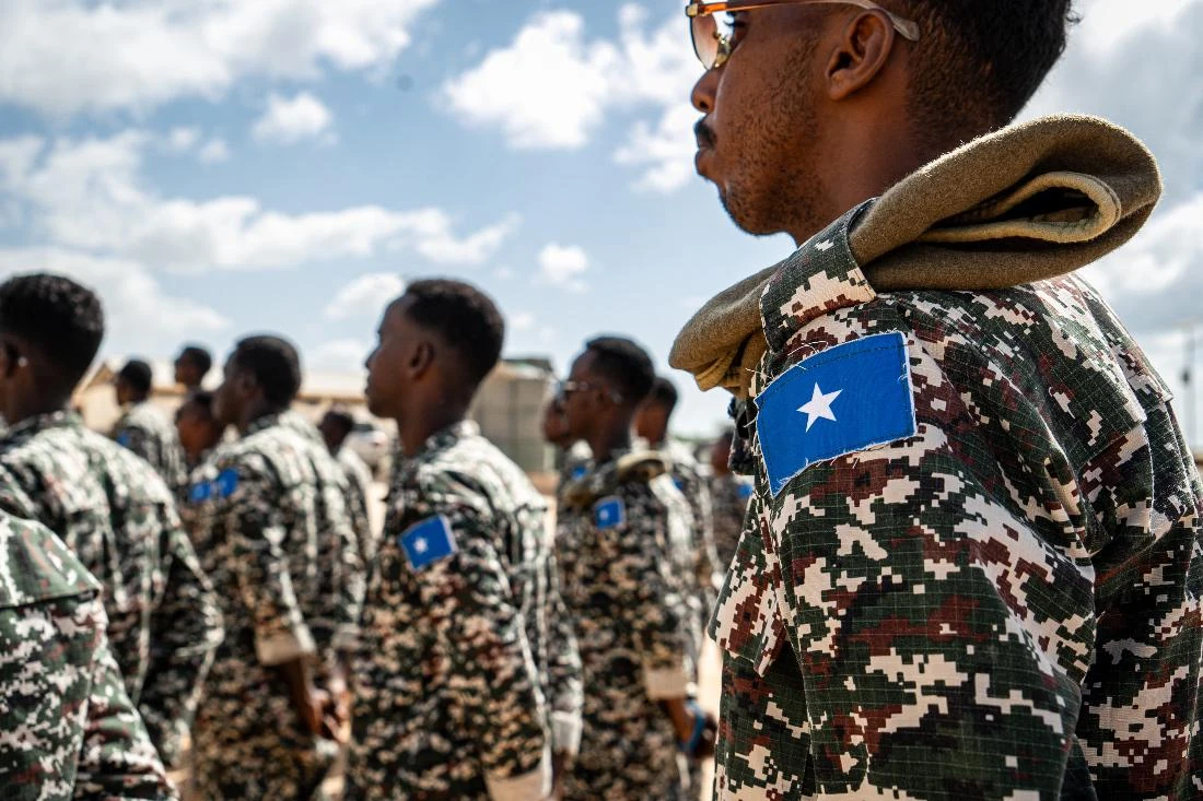 A Somali National Army soldier stands at attention during the morning briefing for trainee officers at the General Dhagabadan Training Centre in Mogadishu. (AFP)