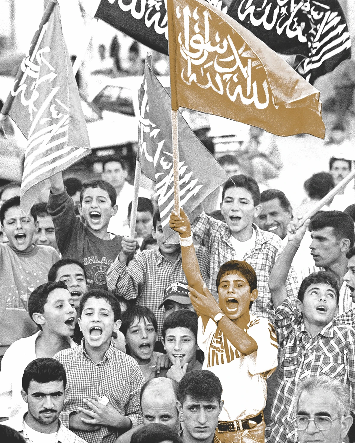 Palestinian boys wave Hamas flags and chant anti-Israel and US slogans during rally in Gaza against Wye River accord. AFP