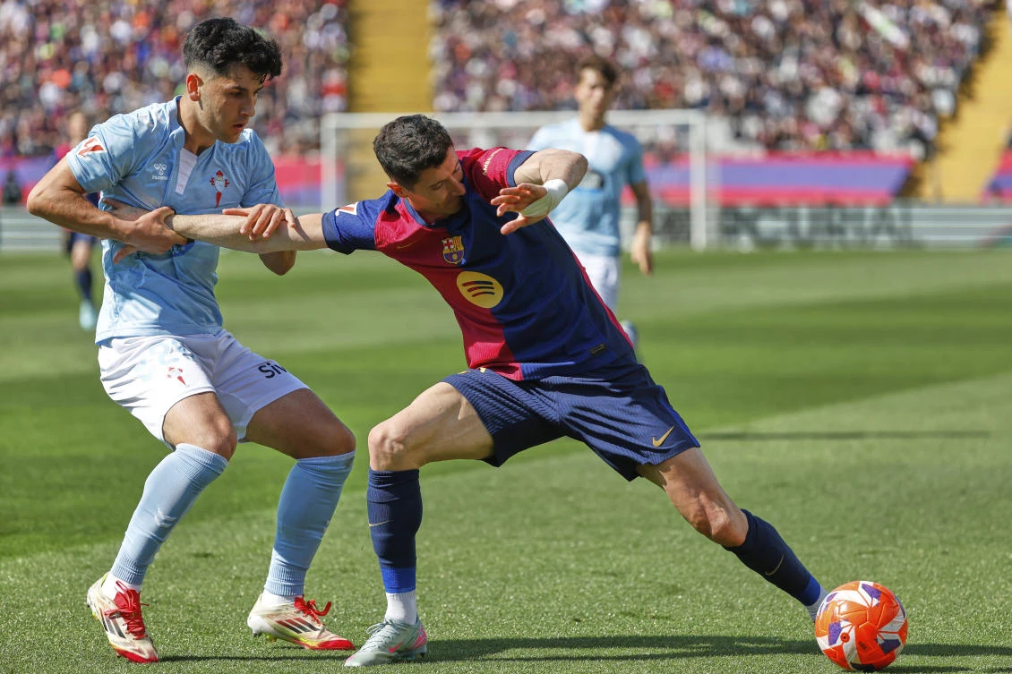 Barcelona’s Robert Lewandowski was diagnosed with a hamstring injury on Sunday and is set to miss the Copa del Rey final and Champions League semifinal according to Spanish media reports. (AP)