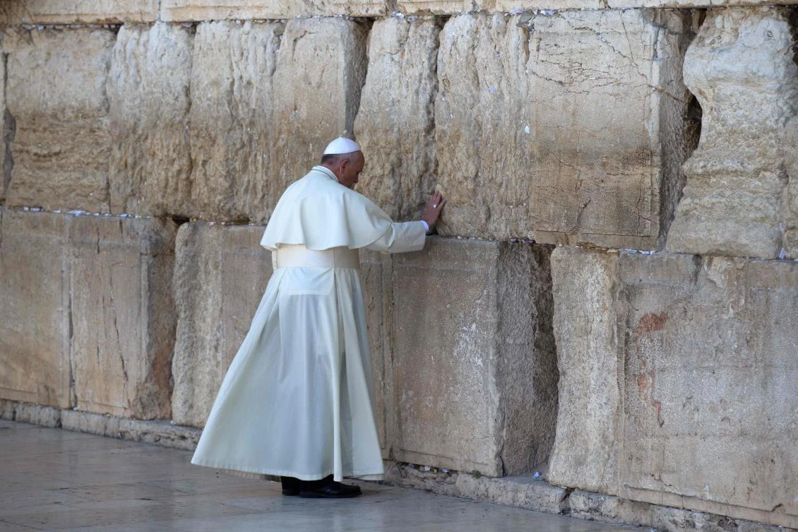Pope Francis prays at the Western Wall, Judaism's holiest site, in East Jerusalem's Old City. (File/AFP)