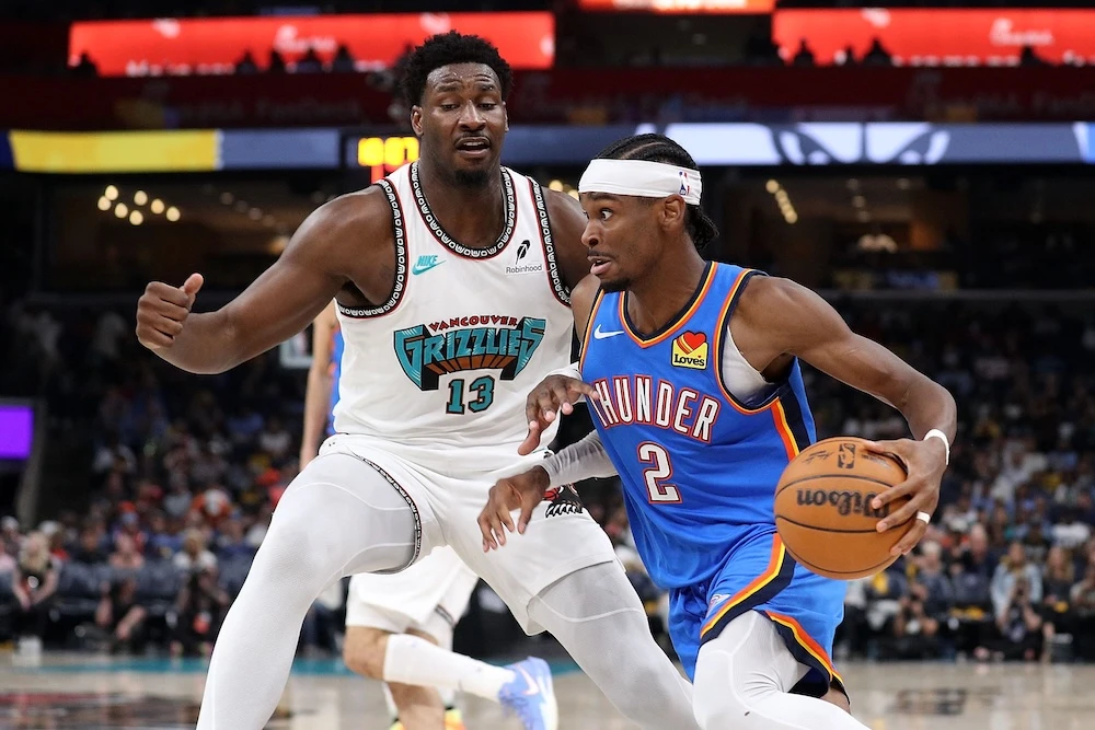Shai Gilgeous-Alexander of the Oklahoma City Thunder drives to the basket against Jaren Jackson Jr. of the Memphis Grizzlies during Game 3 of the Western Conference First Round NBA Playoffs on April 24, 2025 in Memphis, Tennessee. (Getty Images via AFP)