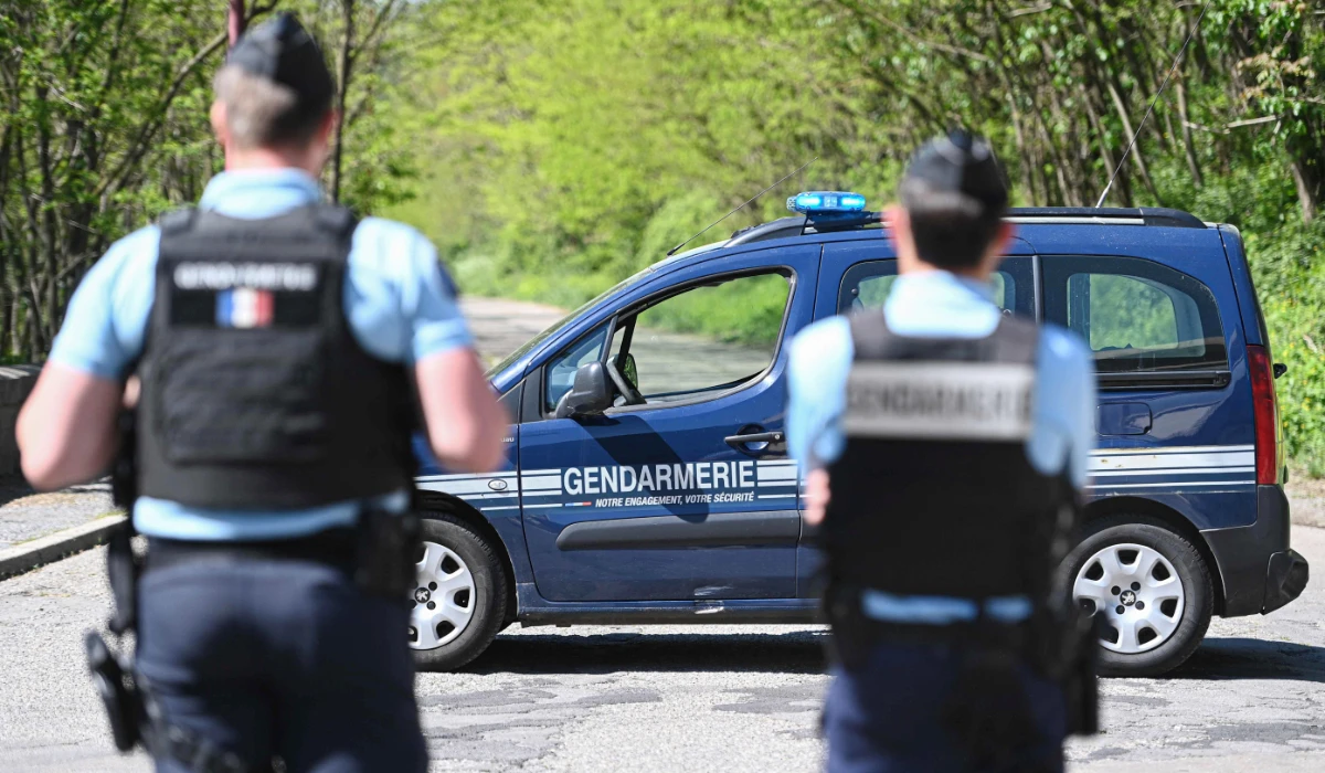 French gendarmes block the access to a road at La Grand-Combe, southern France, on April 25, 2025, after a muslim worshipper was stabbed to death at the local mosque. (AFP)