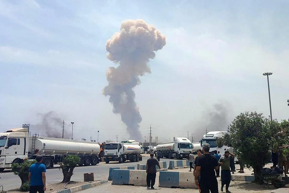 The picture shows smoke rising at the scene of an explosion at the Shahid Rajaee port dock southwest of Bandar Abbas. (File/AFP)