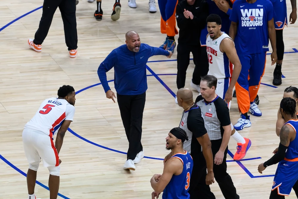 Detroit Pistons head coach J.B. Bickerstaff, center, tries to argue a non-call after the New York Knicks won Game 4 of their NBA basketball first-round playoff series in Detroit on April 27, 2025. (Detroit News via AP)