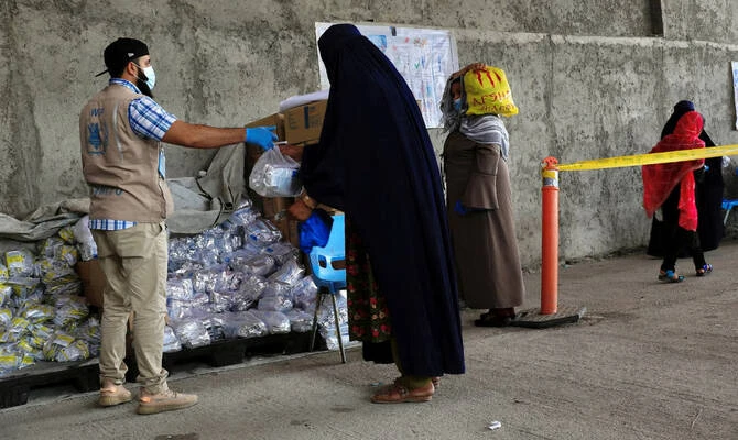 WFP and the UN refugee agency will slash jobs because of funding cuts, mainly from the United States, officials said Tuesday, warning the reductions will severely affect aid programs worldwide. (Reuters/File)