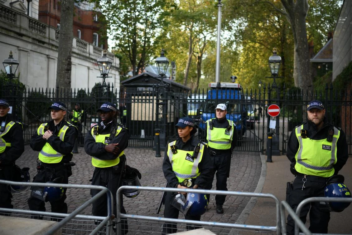 Police officers stand on duty at a road leading to the Embassy of Israel, as people take part in a 'Stand with Palestine' demonstration, in west London on October 9, 2023. (File/AFP)