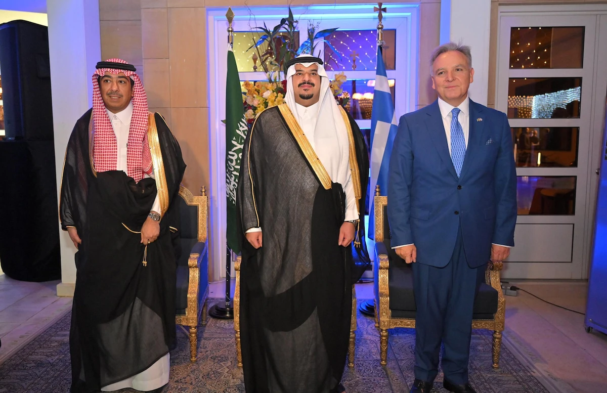 Greek Ambassador Alexis Konstantopoulos cutting cake with Prince Mohammed bin Abdulrahman bin Abdulaziz, Deputy Governor of Riyadh at the Greek National Day reception (Supplied)