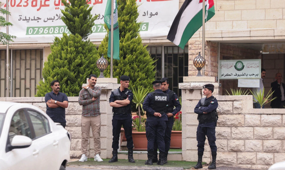 Jordanian police stand outside the Islamic Action Front office in Amman, Jordan April 23, 2025. (Reuters)