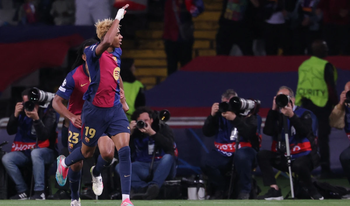 Barcelona's Spanish forward #19 Lamine Yamal celebrates scoring his team's first goal during the UEFA Champions League semi final first leg football match between FC Barcelona and Inter Milan at the Estadi Olimpic Lluis Companys in Barcelona on April 30, 2025. (AFP)