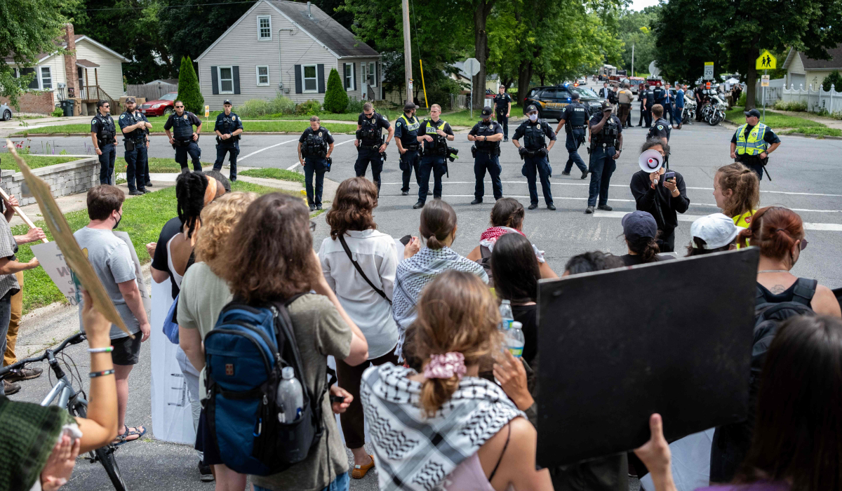 Pro-Palestine protesters gather outside of Sherman Middle School in Madison, Wisconsin. (AFP)