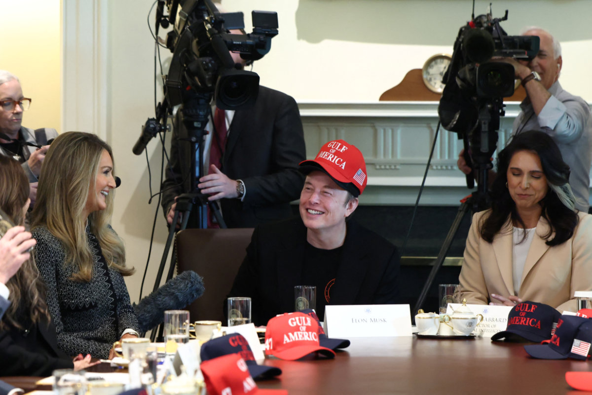 Tesla CEO Elon Musk reacts while wearing a cap with the words "Gulf of America" as he attends a cabinet meeting held by US President Donald Trump at the White House in Washington, on April 30, 2025. (REUTERS)