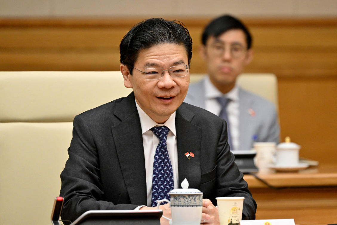 Singapore's Prime Minister Lawrence Wong takes part in a meeting with Vietnam's Prime Minister at the Government Office in Hanoi. (File/AFP)