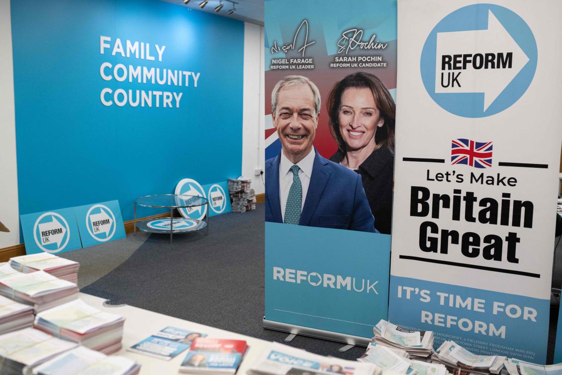 Promotional material is pictured at the campaign office of the Reform UK candidate in the forthcoming by-election, Sarah Pochin, in the Runcorn Shopping City mall, in Runcorn, north west England on April 24, 2025. (AFP)
