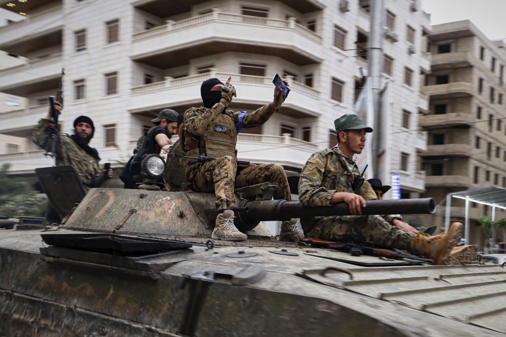 Members of Syria's security forces deploy in the town of Sahnaya, south of Damascus, on Wednesday, April 30, 2025, after earlier clashes with Druze fighters left at least 11 people dead. (AP)