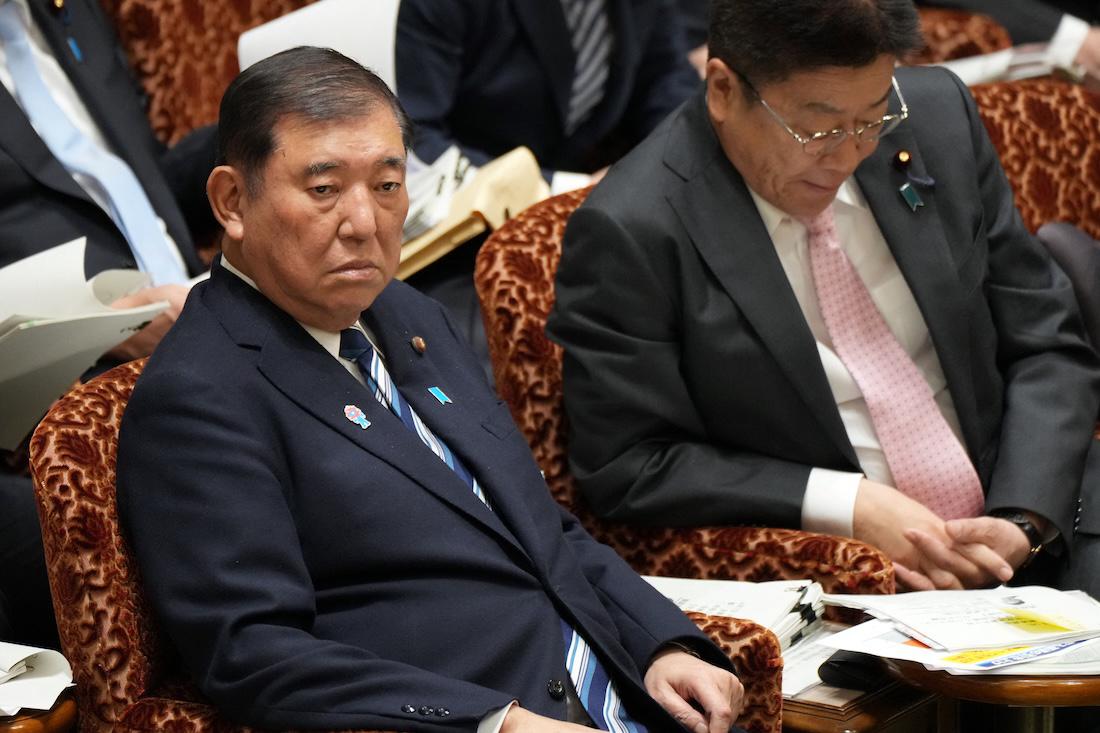 Japan's Prime Minister Shigeru Ishiba (L) and Finance Minister Katsunobu Kato attend a parliamentary committee session in Tokyo. (AFP)