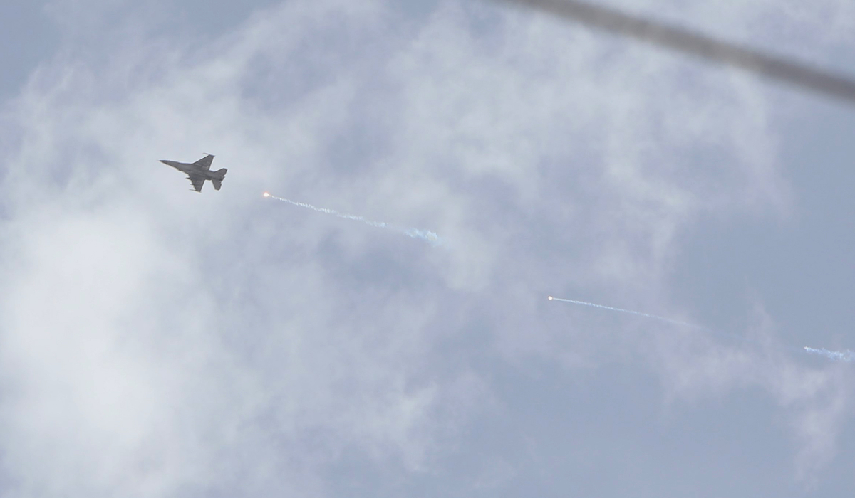 An Israeli fighter jet fires a rocket as it flies over an area near the Syrian capital Damascus on April 30, 2025. (AFP)