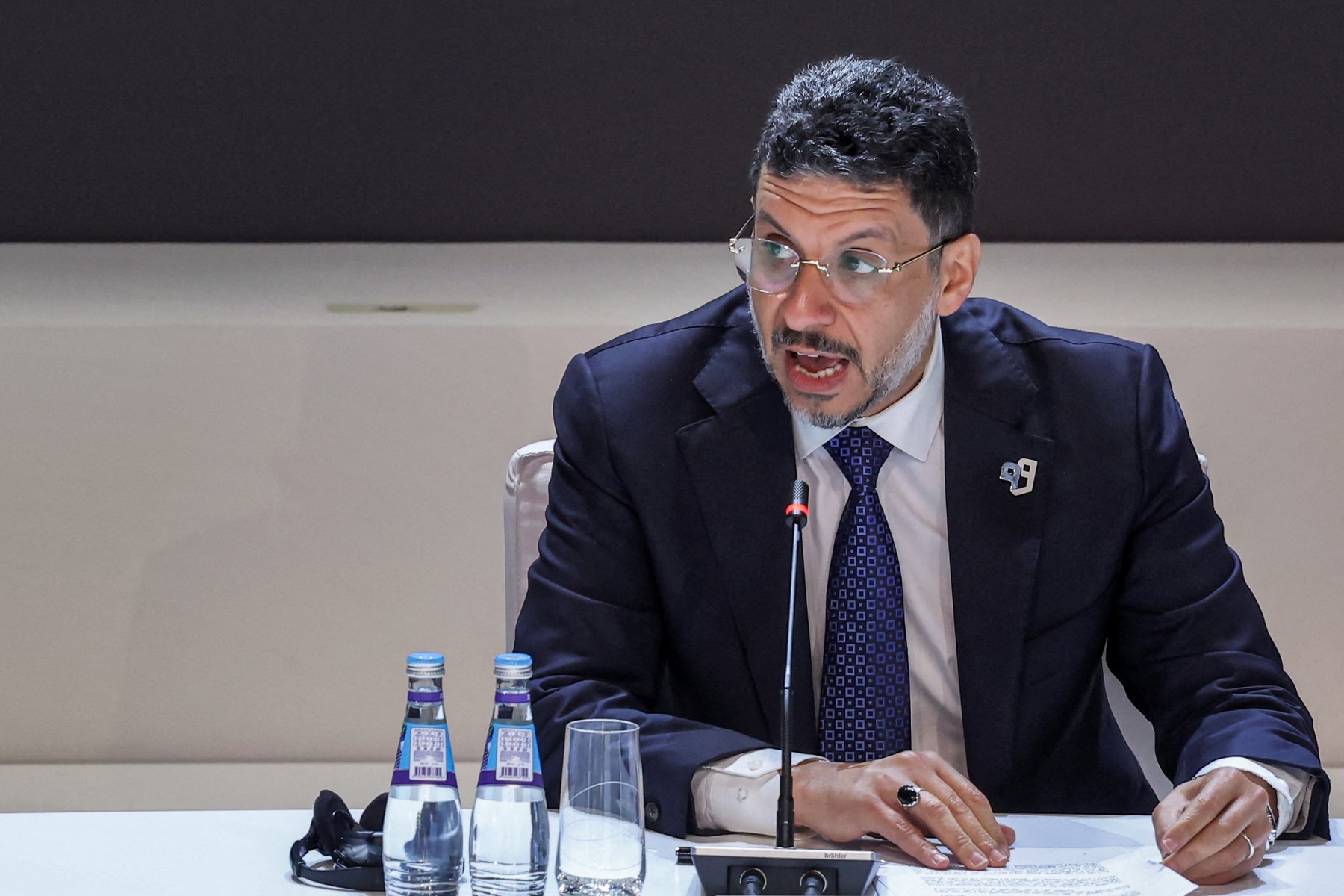 Ahmad Awad bin Mubarak, former Prime Minister of Yemen's internationally-recognised government, speaks during the fifth observance of the "International Day to Protect Education from Attack" at the Qatar National Convention Centre in Doha on September 9, 2024. (AFP)