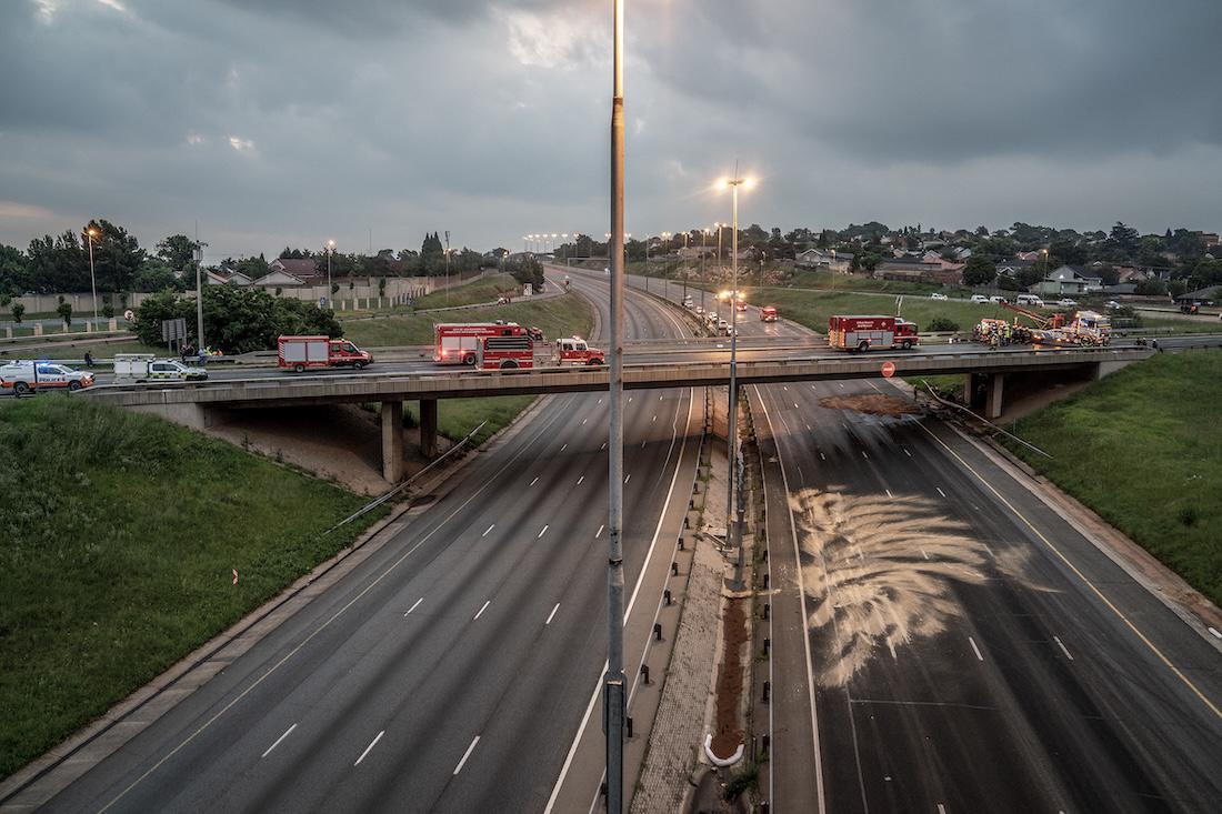 A general view image of the closed N12 highway as paramedics and emergency service personnel work on the scene. (File/AFP)