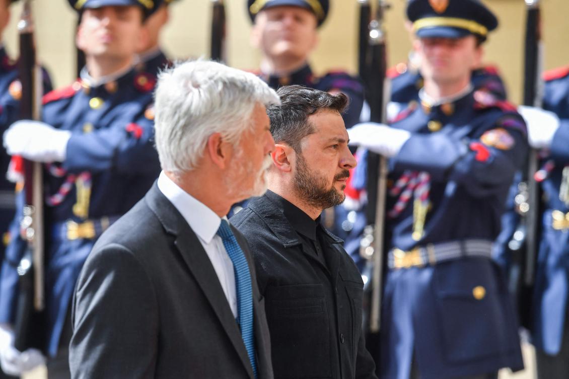 Czech President Petr Pavel (L) and Ukrainian President Volodymyr Zelensky review a military honor guard in front of Prague Castle in Prague, Czech Republic, on May 4, 2025. (AFP)