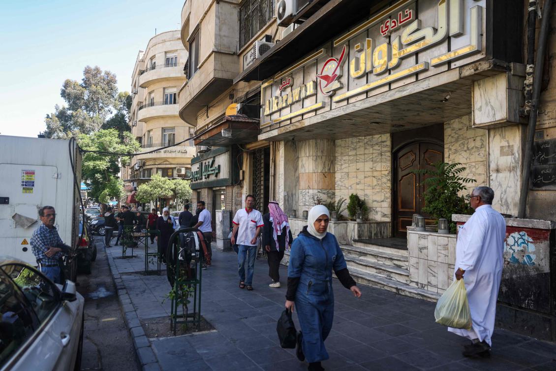 Woman killed as gunmen attack Damascus nightclub: monitor, witness