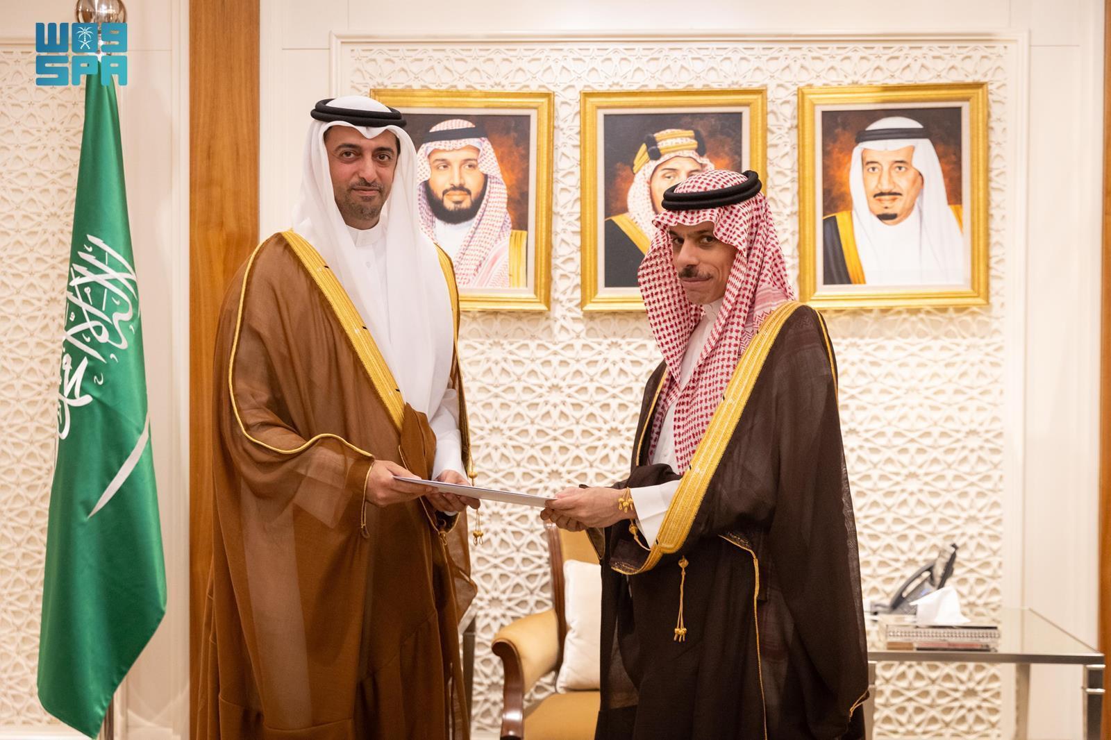 The Qatari ambassador to Saudi Arabia, Bandar Al-Attiyah, presented the invitations to the minister of foreign affairs, Prince Faisal bin Farhan, in Riyadh on Monday. (SPA)
