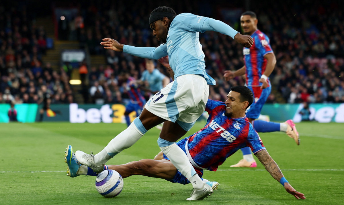Nottingham Forest's Anthony Elanga in action with Crystal Palace's Daniel Munoz during their English Premier League match between Crystal Palace and Nottingham Forest at Selhurst Park, London, Britain, May 5, 2025. (Reuters)