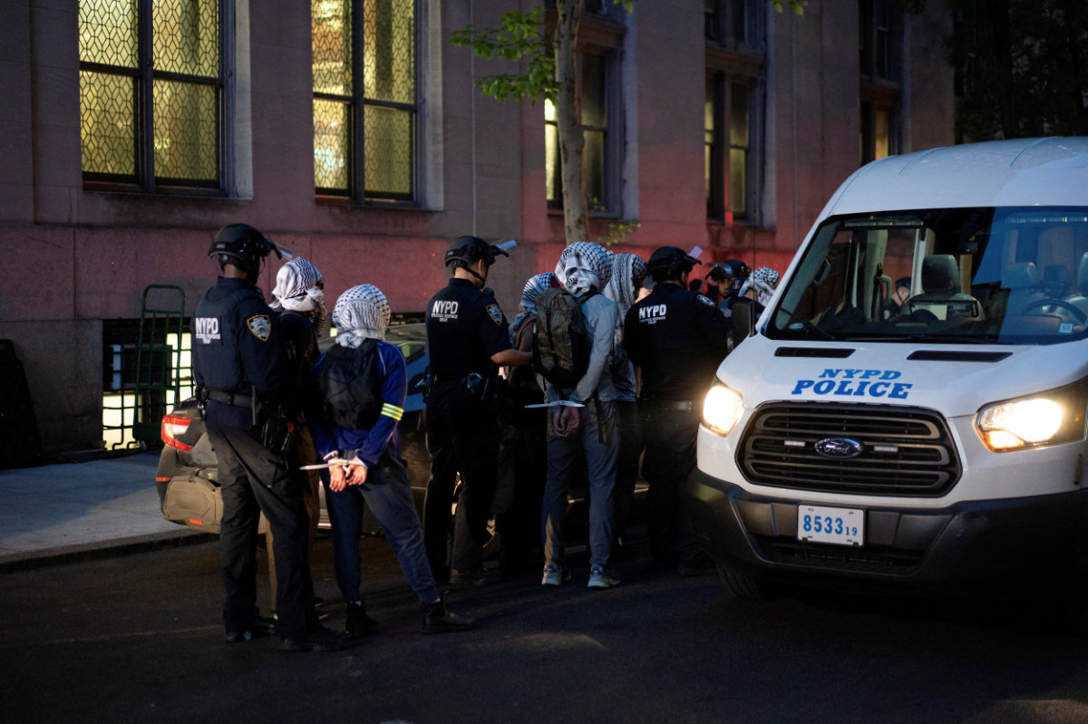 Pro-Palestinian protesters are detained by NYPD after participating in a pro-Palestinian demonstration at Butler Library on Columbia University campus in New York on May 7, 2025. (REUTERS)
