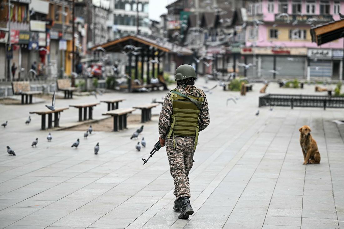 An Indian paramilitary soldier patrols at a marketplace in Srinagar on May 10, 2025. (File/AFP)