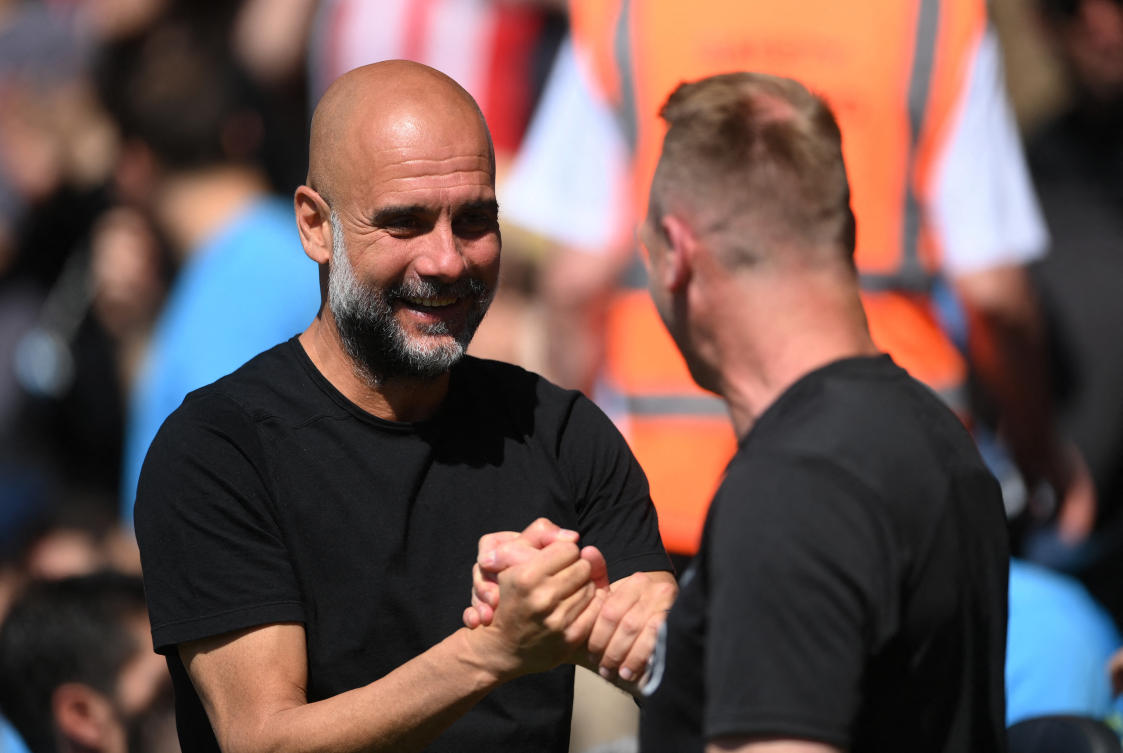 Manchester City manager Pep Guardiola shakes hands with Southampton interim manager Simon Rusk before their Premier League match at St. Mary’s Stadium, Southampton, May 10, 2025. (Reuters)