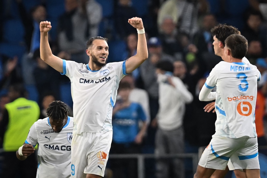 Marseille’s Algerian forward Amine Gouiri (L) celebrates after scoring his team’s third goal at the end of the French L1 football match between Le Havre AC and Olympique de Marseille at The Stade Oceane in Le Havre, north-western France, on Saturday. (AFP)