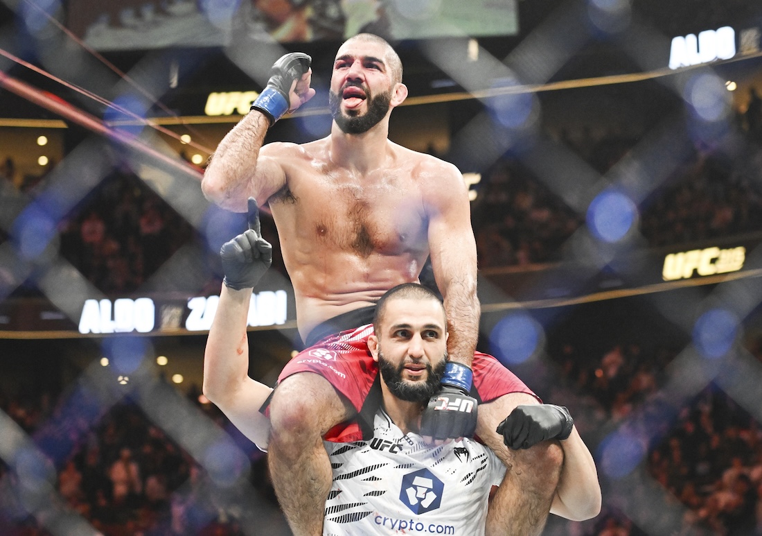 Aiemann Zahabi, top, following his win over Jose Aldo during their UFC 315 mixed martial arts featherweight bout in Montreal Saturday. (The Canadian Press via AP)