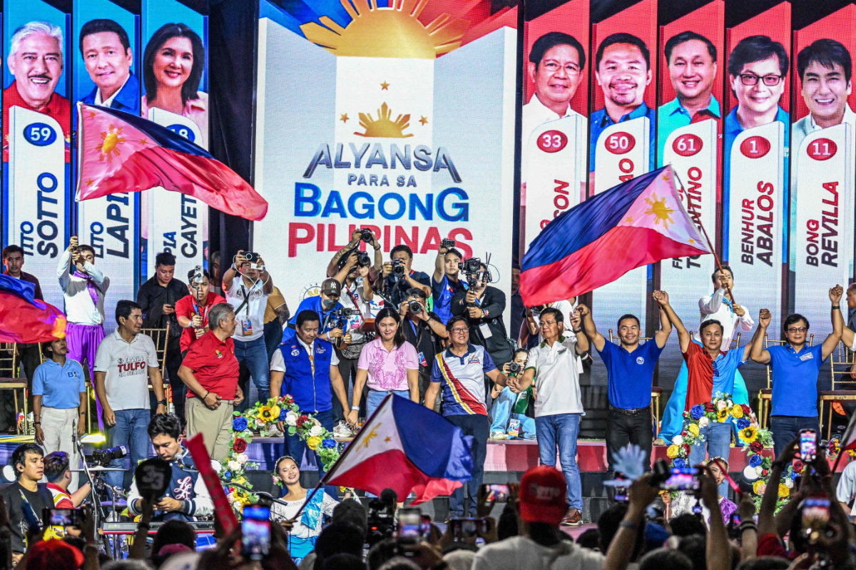 Philippines' President Ferdinand Marcos Jr (C) attends a campaign rally of senatorial candidates under his party in Mandaluyong, Metro Manila, on May 9, 2025, ahead of the midterm elections. (AFP)