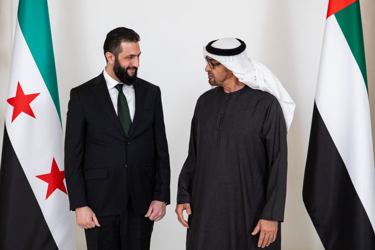 This handout picture provided by the UAE Presidential Court shows Emirati President Sheikh Mohamed bin Zayed al-Nahyan (R) meeting with Syria's interim President Ahmed al-Sharaa at Al-Shati palace on April 13, 2025. (AFP)