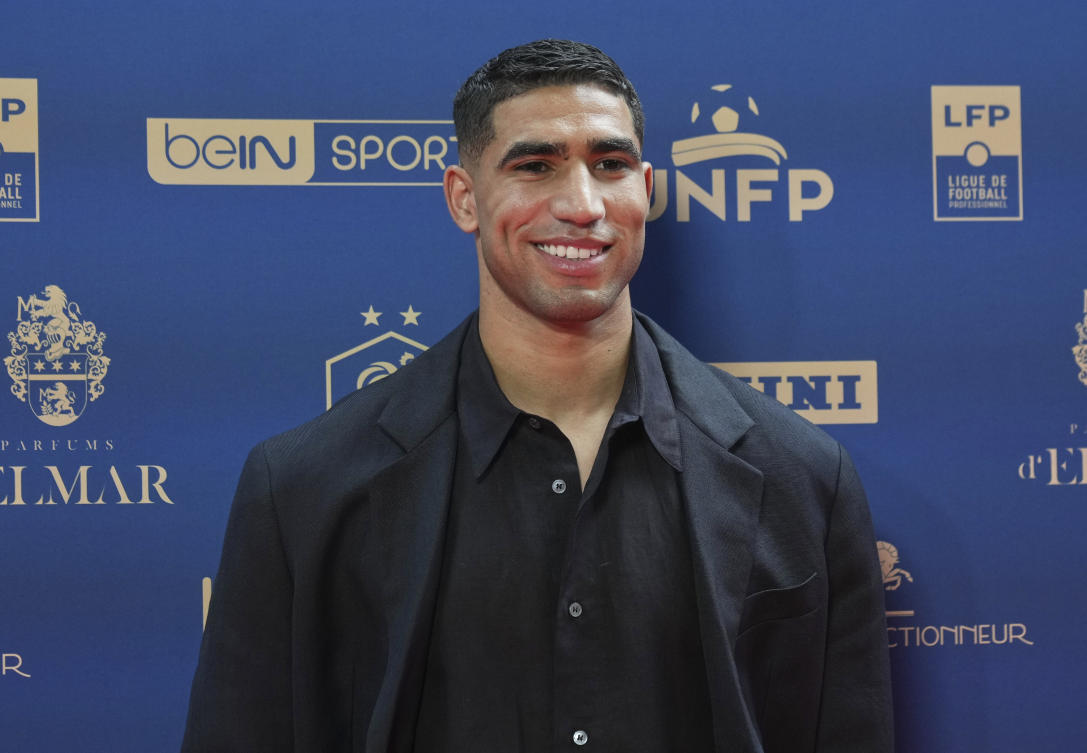 Paris Saint Germain's Achraf Hakimi arrives at the UNFP (French player's union) Trophies ceremony in Paris, France, Sunday, May 11, 2025. (AP)