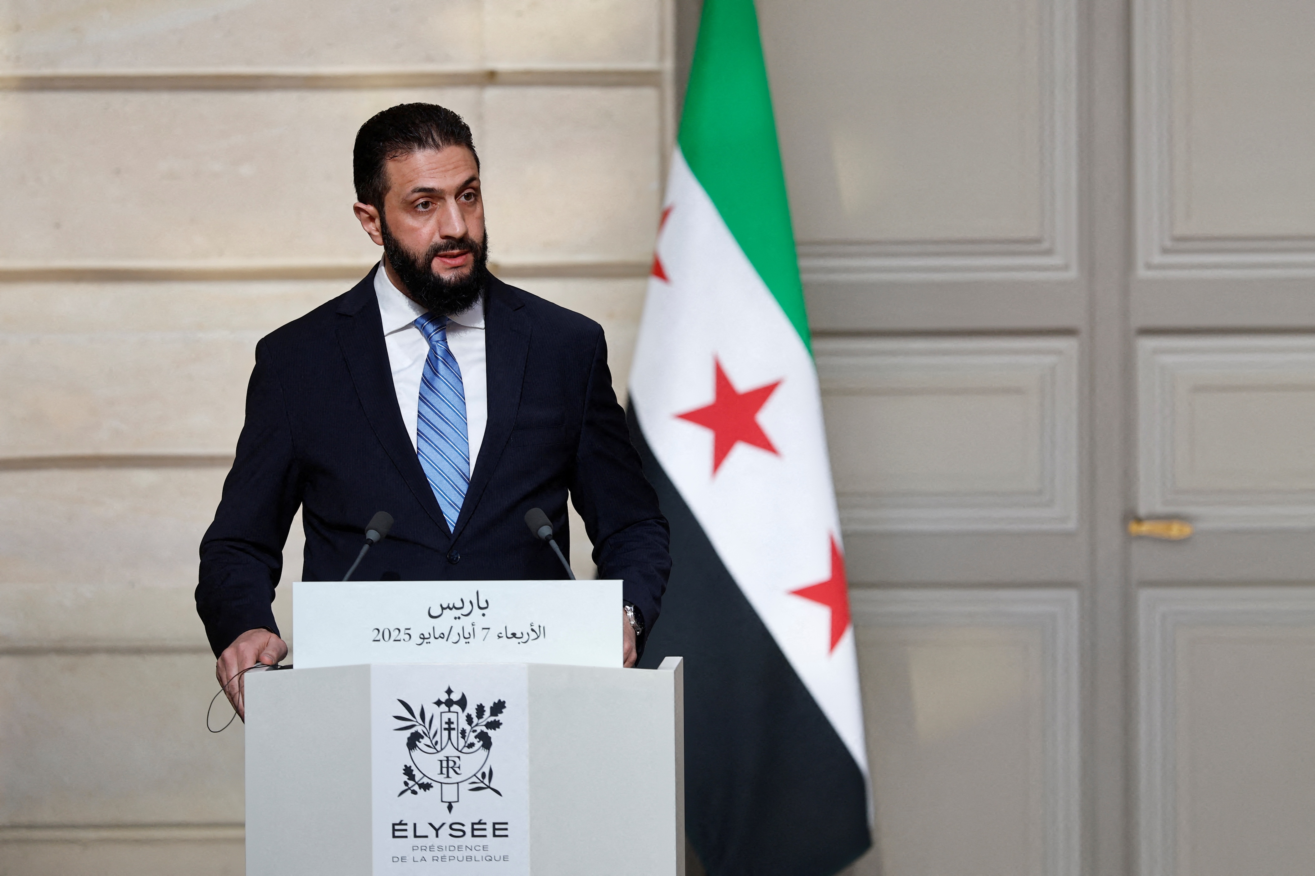 Syrian President Ahmed al-Sharaa speaks during a joint press conference with French President after a meeting at the Elysee Palace in Paris, May 7, 2025. (AFP)