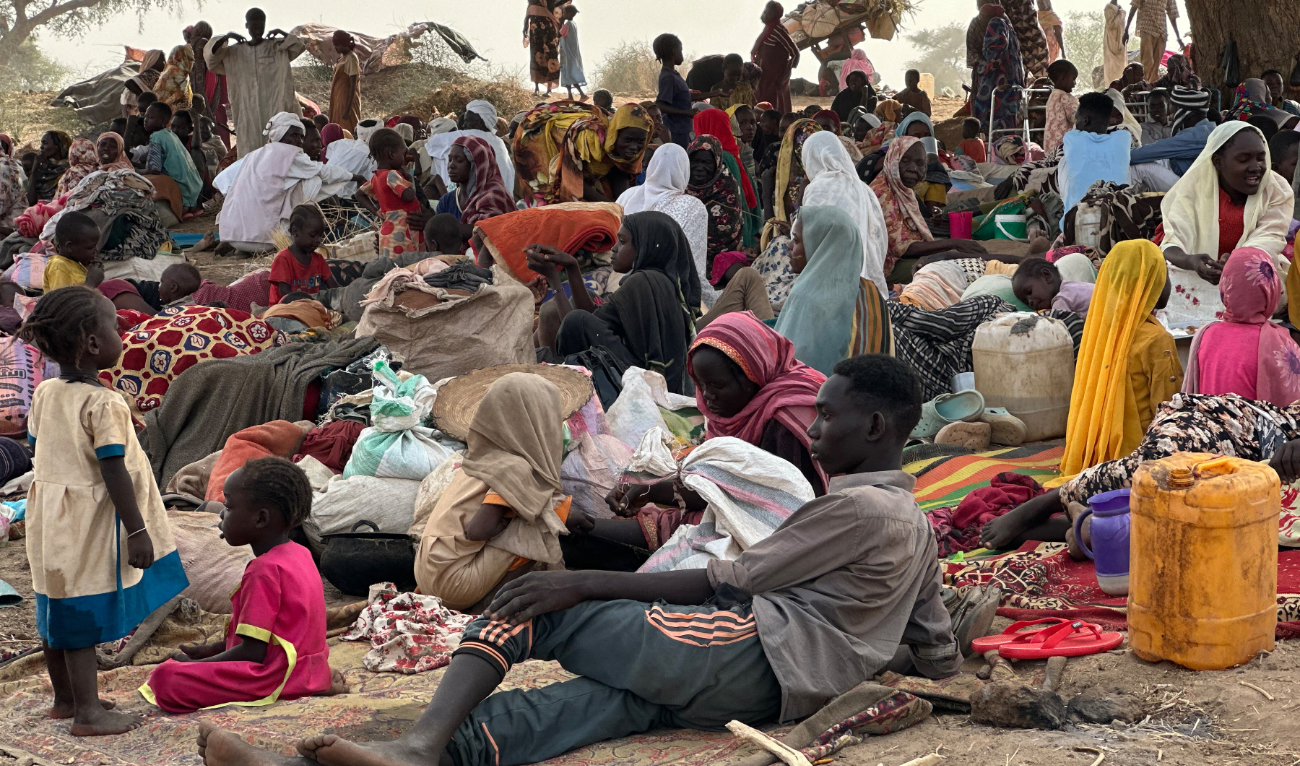 People who fled the Zamzam camp for the internally displaced after it fell under RSF control, rest in a makeshift encampment in an open field near the town of Tawila in war-torn Sudan's western Darfur region on April 13, 2025. (AFP/File)