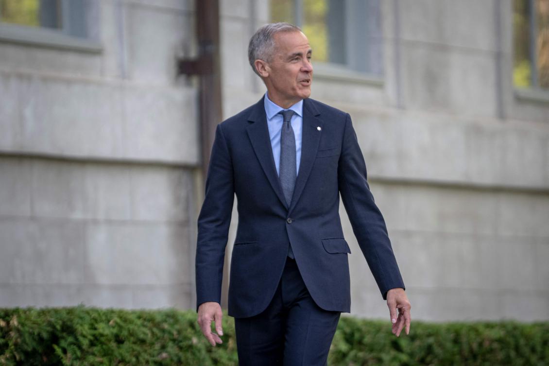 Canadian Prime Minister Mark Carney arrives at Rideau Hall for his cabinet’s swearing-in ceremony on May 13, 2025 in Ottawa. (AFP)
