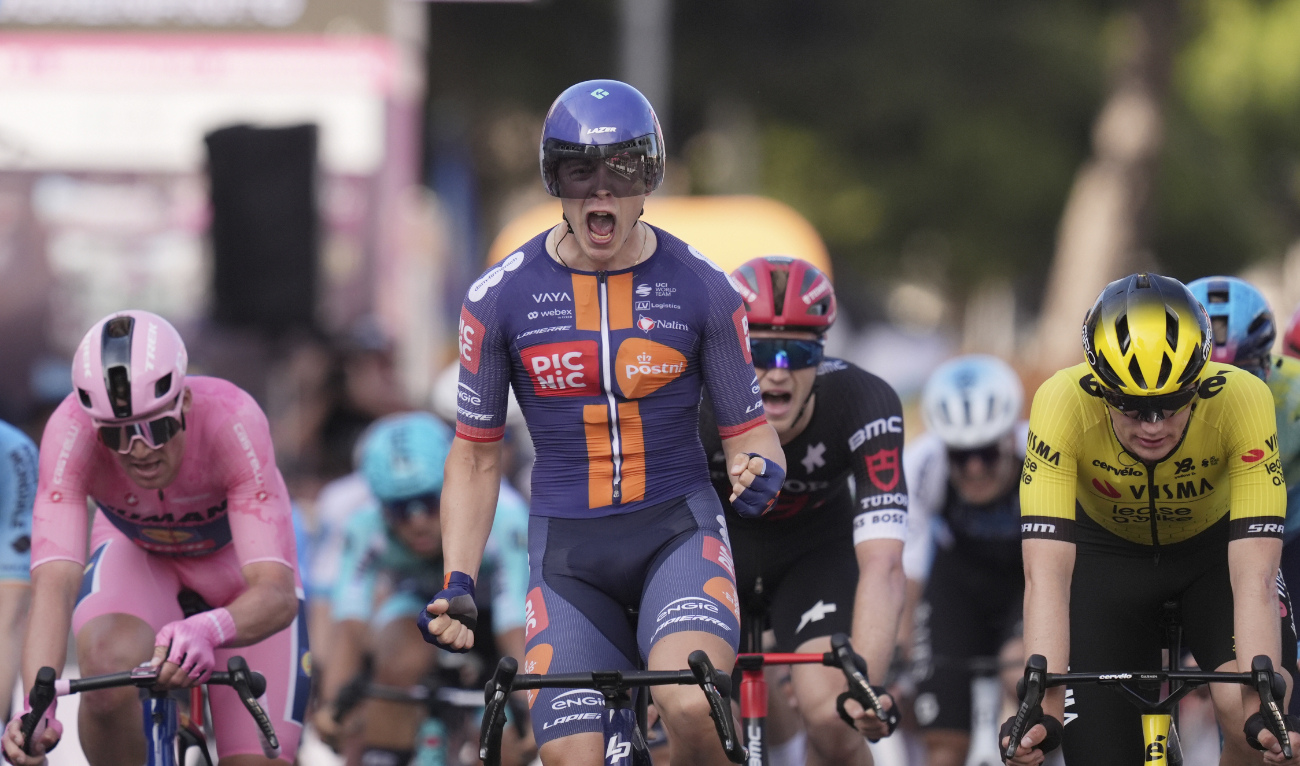 Netherlands’ Casper van Uden celebrates as he crosses the finish line to win the fourth stage of the Giro d’Italia cycling race, from Alberobello to Lecce, southern Italy, Tuesday. (LaPresse via AP)