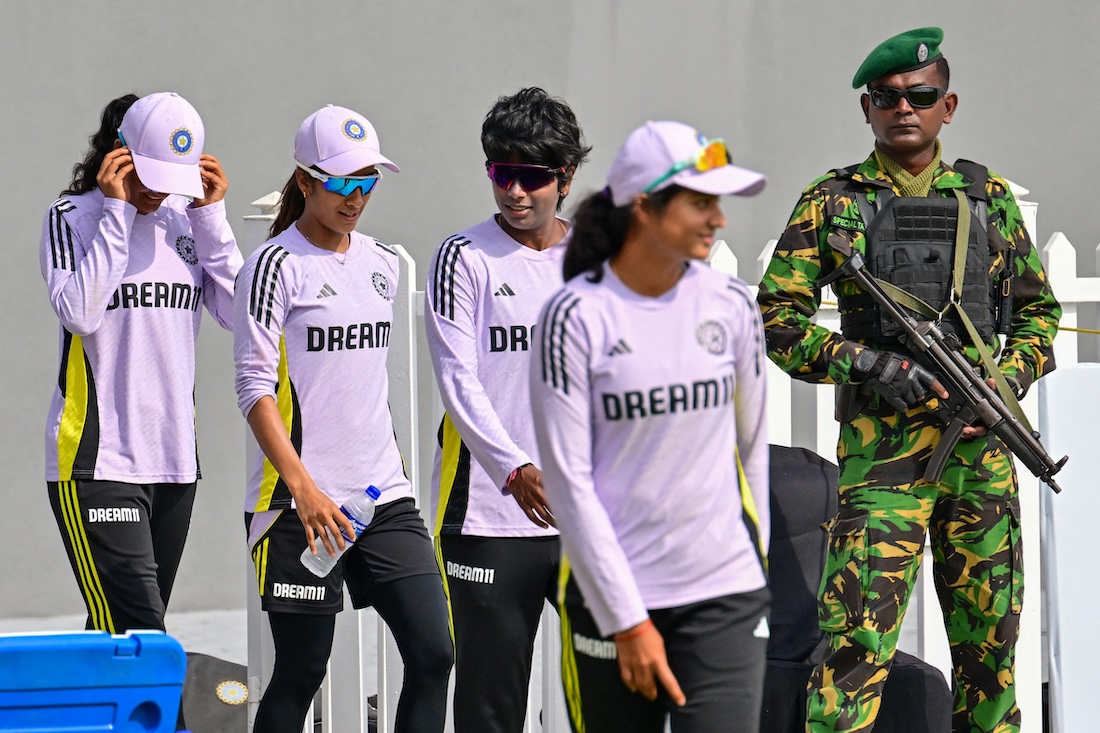 India's Arundhati Reddy (C) and teammates arrive on the ground before the start of the Tri-Nation one-day international (ODI) final cricket match between India and Sri Lanka. (File/AFP)