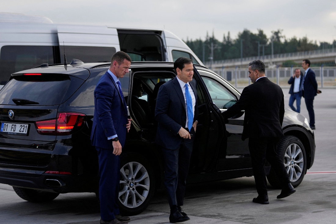 US Secretary of State Marco Rubio exits car to board a plane departing to Istanbul. (Pool)