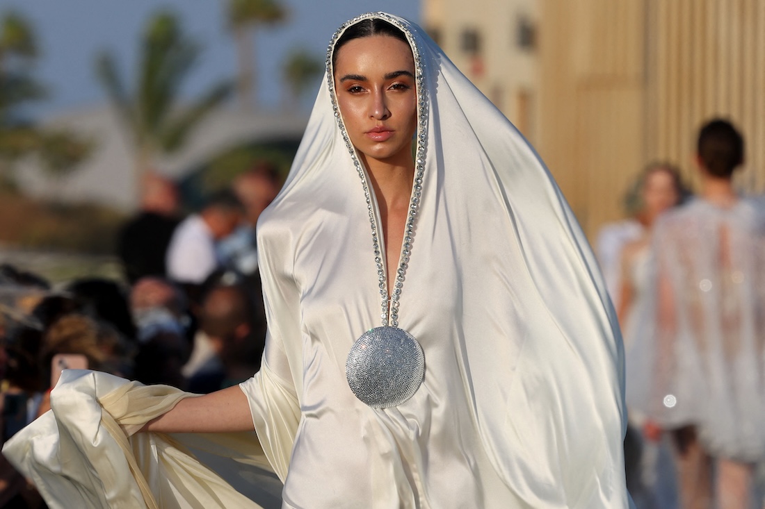 A model presents a creation of Saudi designer Tima Abid during the Red Sea Fashion Week in Saudi Arabia's Red Sea resort of Ummahat Island. (File/AFP)