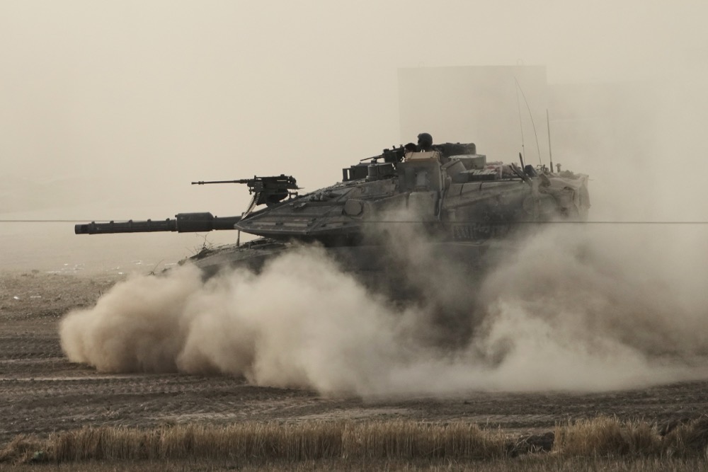 An Israeli tank moves in a staging area in southern Israel, near the border with Gaza, Friday, May 16, 2025. (AP)