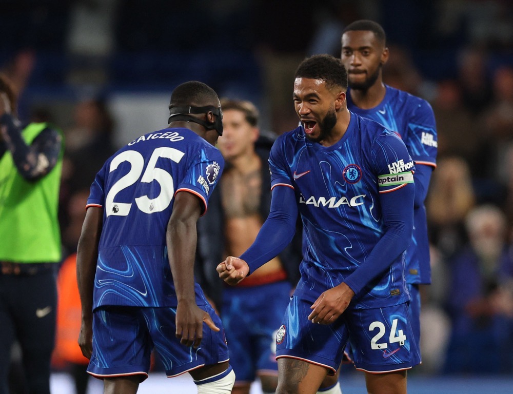 Chelsea's Moises Caicedo and Reece James celebrate after the match. (Reuters)