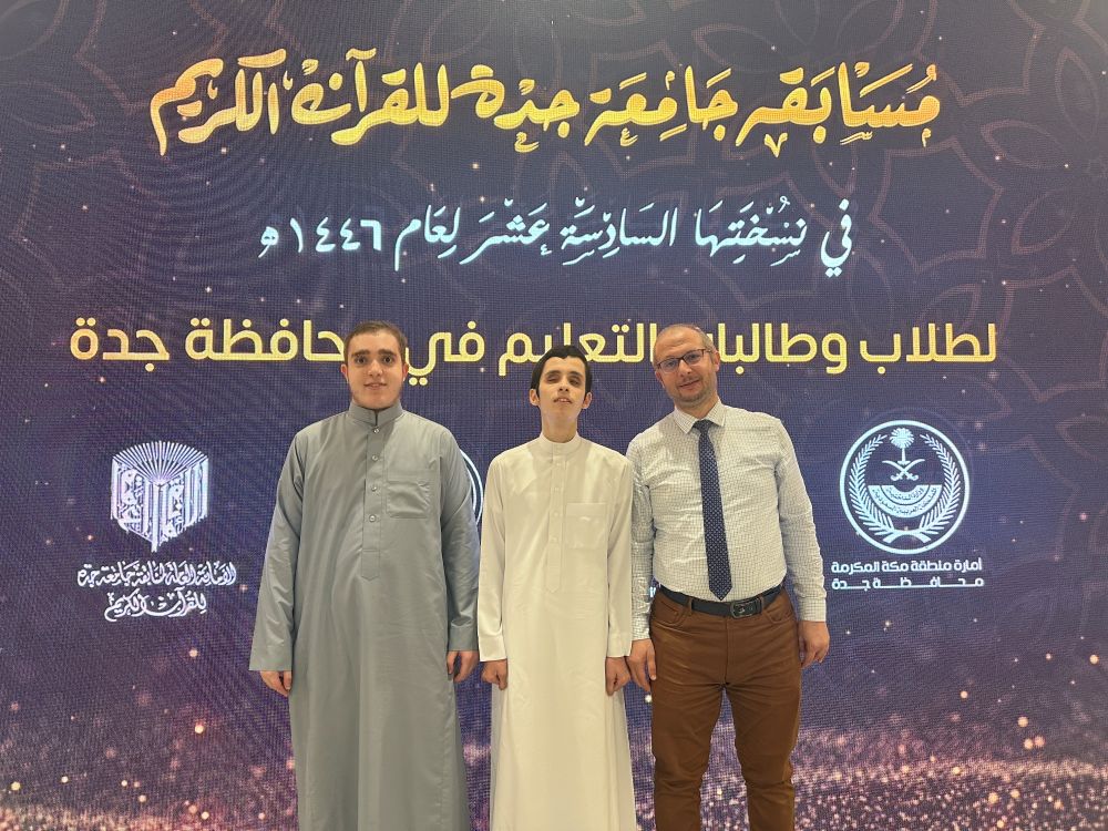 Ibrahim Shaheen from Egypt, center, won first place in the visually impaired category and received a SR7,000 cash prize. The 17-year-old has memorized the entire Qur’an using braille since the age of 12. (AN Photo/Nada Hameed)