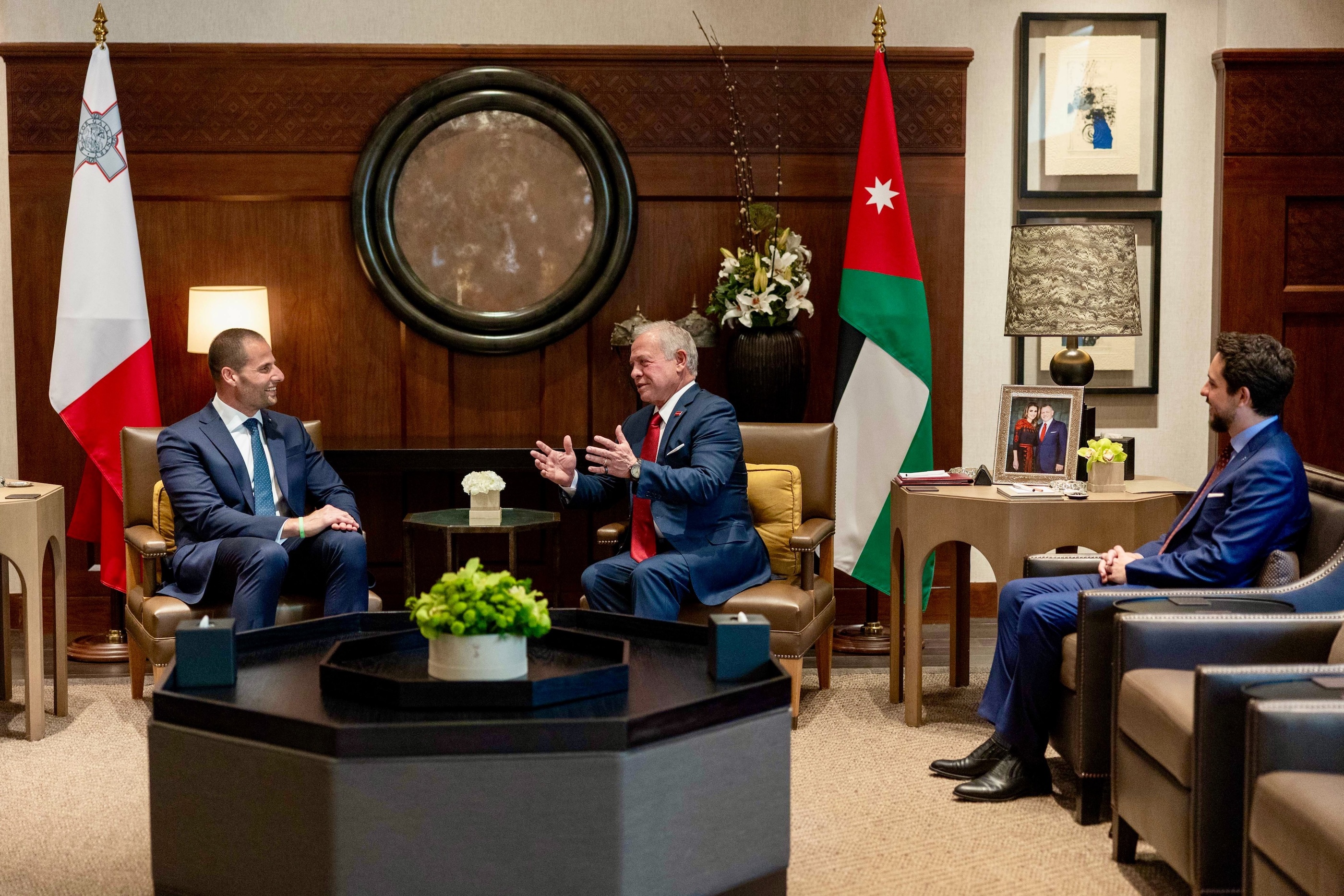 King Abdullah II of Jordan, the Maltese Prime Minister Robert Abela, and Crown Prince Hussein during a meeting at Al-Husseiniya Palace in Amman on Monday. (Petra)
