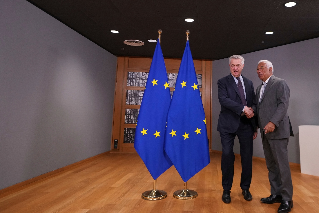 European Council President Antonio Costa greets UN High Commissioner Refugees Filippo Grandi at the European Council building in Brussels, Belgium. (AP)